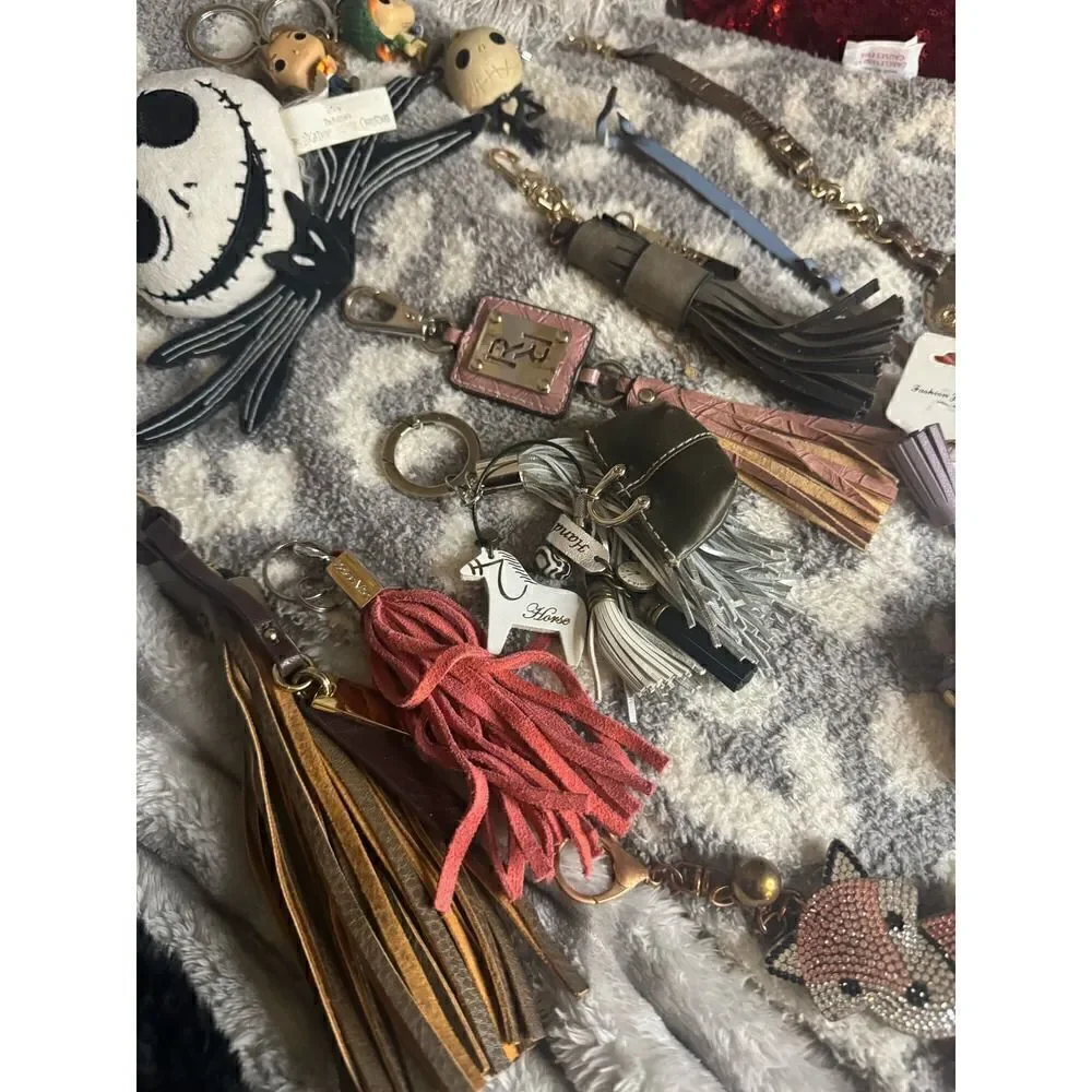 Lot of designer keychains,bag charms bling disney tassell